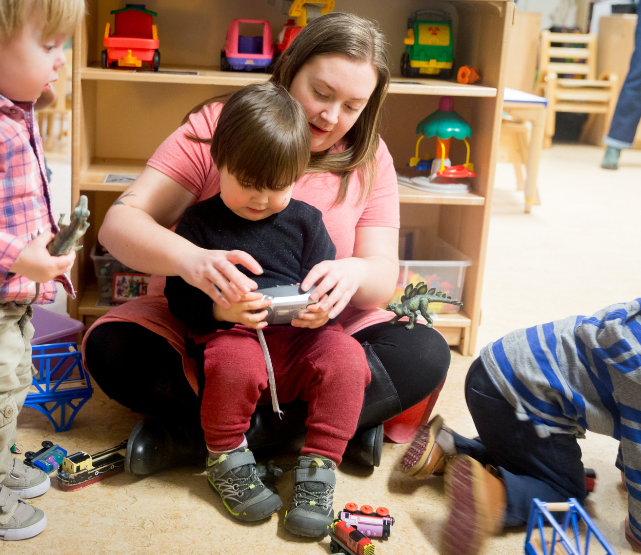 woman helping a child